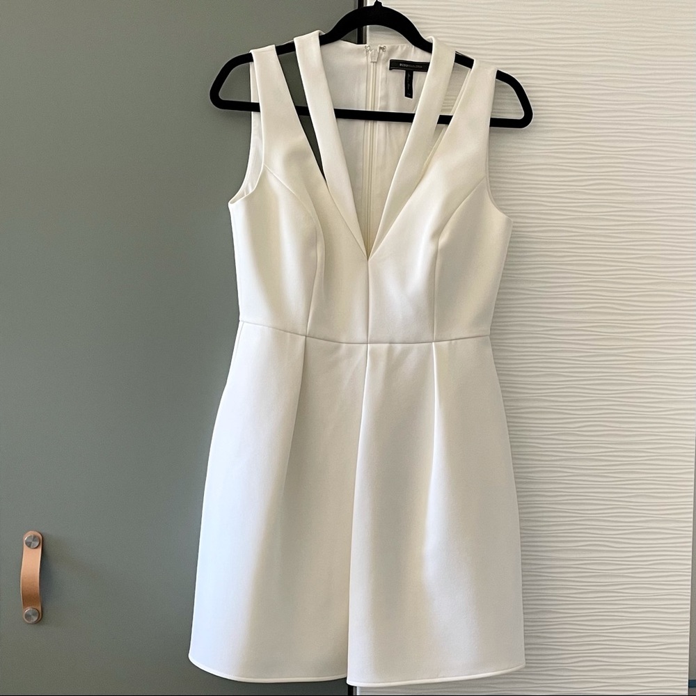 Elegant & edgy white BCBG dress WITH POCKETS